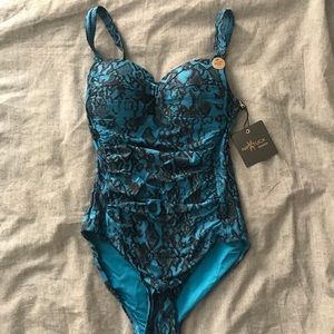 Nip tuck blue one piece bathing suit
